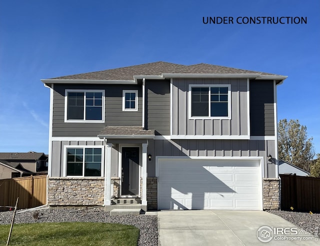 view of front of property featuring a garage