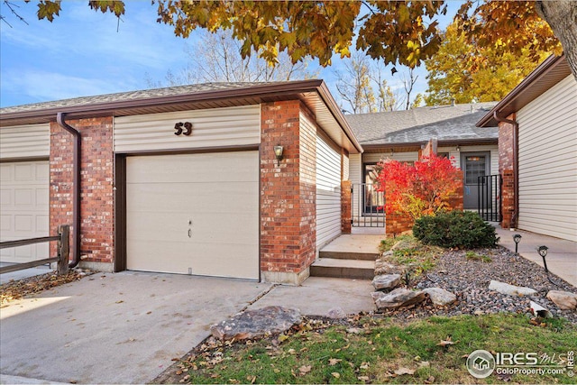 single story home featuring a garage