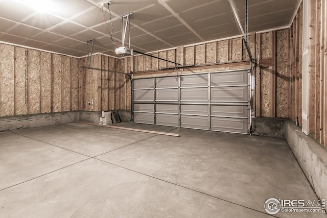 6105 Saddle Horn Dr, Timnath, CO 80547 - garage featuring a garage door opener
