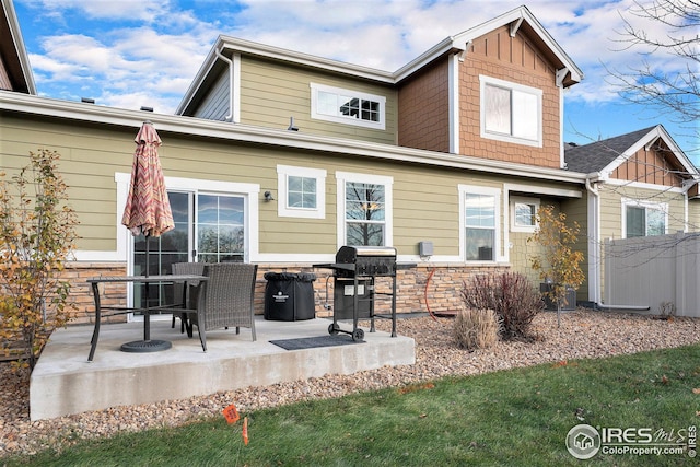 back of house with a patio area