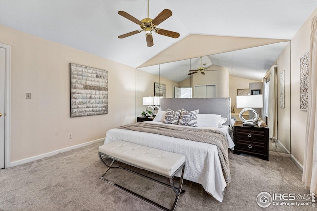 carpeted bedroom featuring ceiling fan and vaulted ceiling