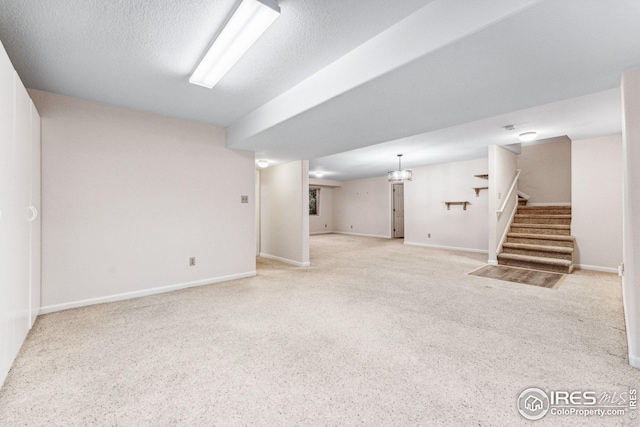 basement with a textured ceiling