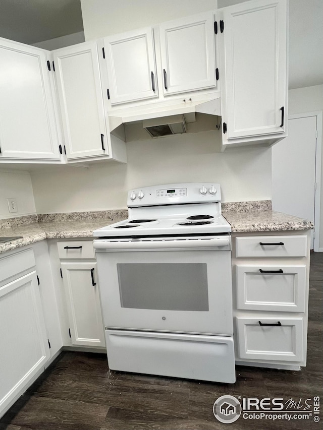 kitchen with white range with electric stovetop, white cabinetry, and dark hardwood / wood-style floors