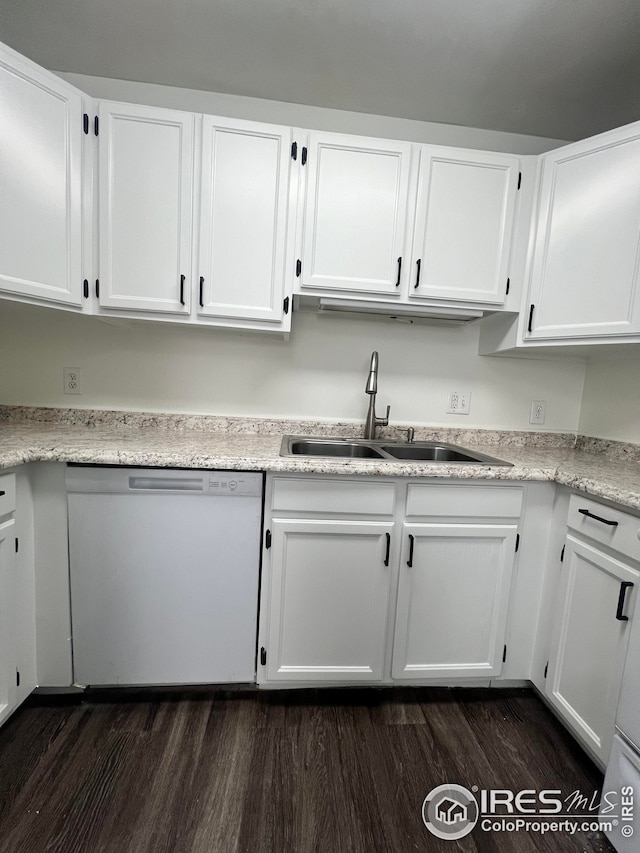 kitchen with white cabinets, dishwasher, dark hardwood / wood-style floors, and sink