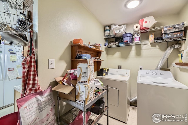 laundry area with washer and dryer