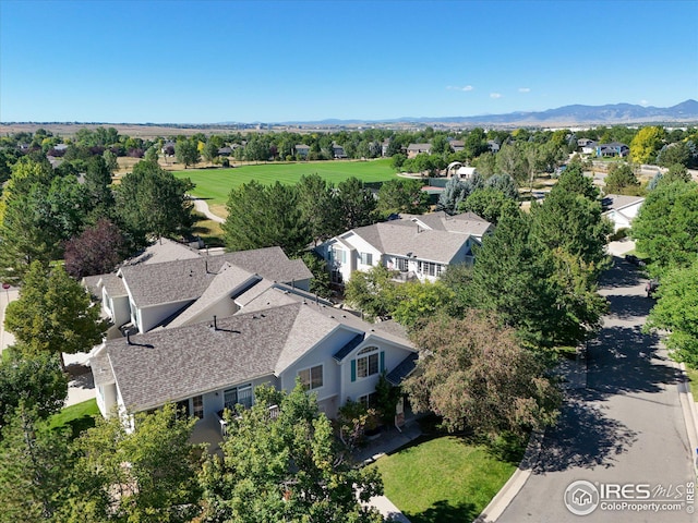 birds eye view of property featuring a mountain view