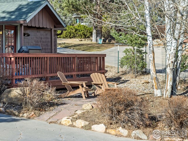 view of yard with a wooden deck