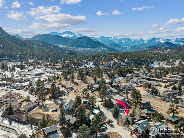 bird's eye view with a mountain view