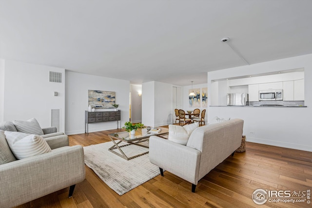 living room featuring light hardwood / wood-style flooring