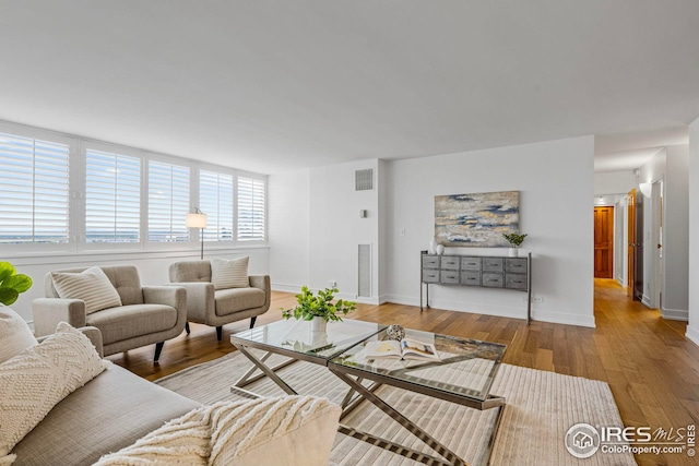 living room featuring light wood-type flooring