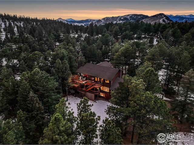 aerial view at dusk with a mountain view