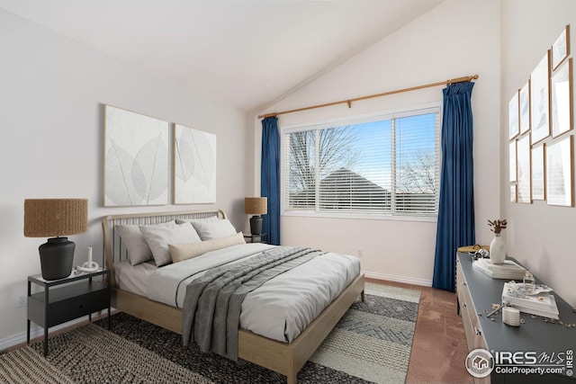 bedroom with vaulted ceiling