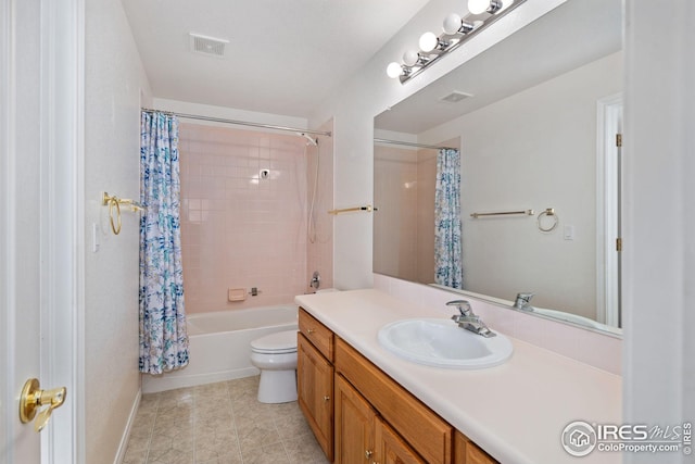 full bathroom with vanity, toilet, and shower / bath combo