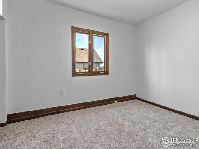 empty room with carpet floors