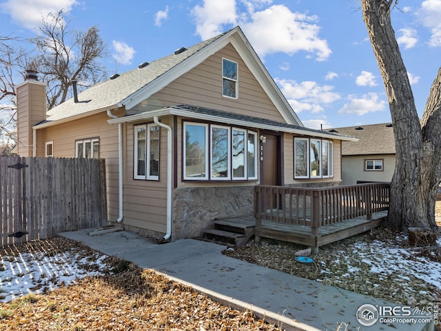 view of front of house featuring a wooden deck