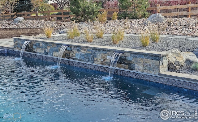 exterior space featuring fence
