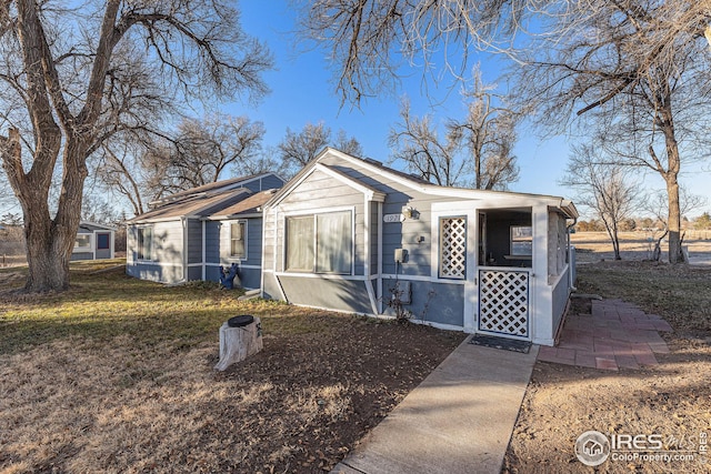 view of front of home with a front yard