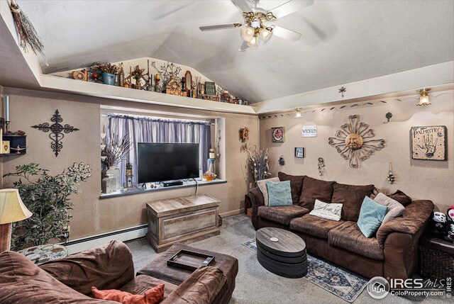 living room featuring light colored carpet, vaulted ceiling, and a baseboard heating unit