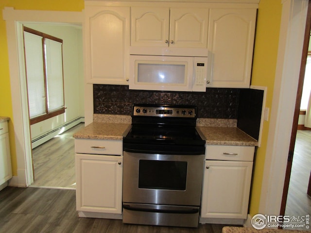 kitchen featuring tasteful backsplash, white cabinetry, stainless steel range with electric cooktop, and a baseboard heating unit