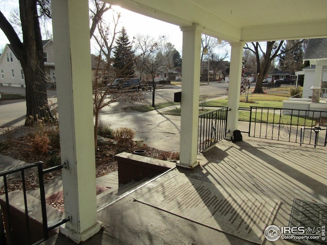 wooden terrace with covered porch