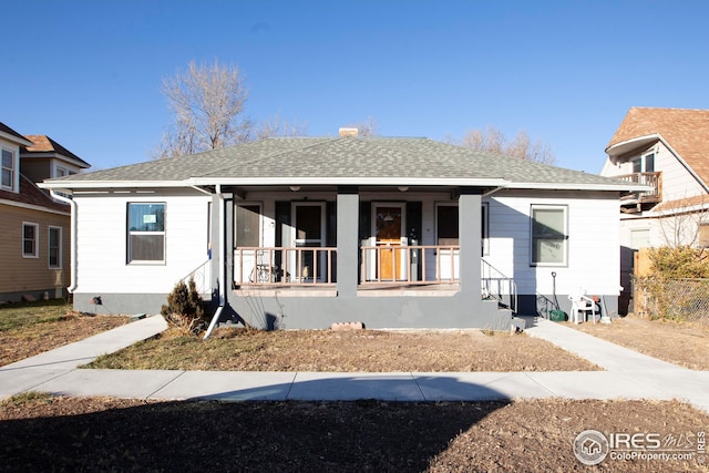 view of front of property featuring covered porch