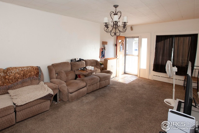 carpeted living room with a baseboard heating unit and an inviting chandelier