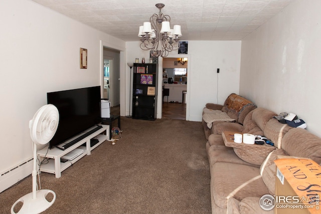 carpeted living room with a chandelier and baseboard heating