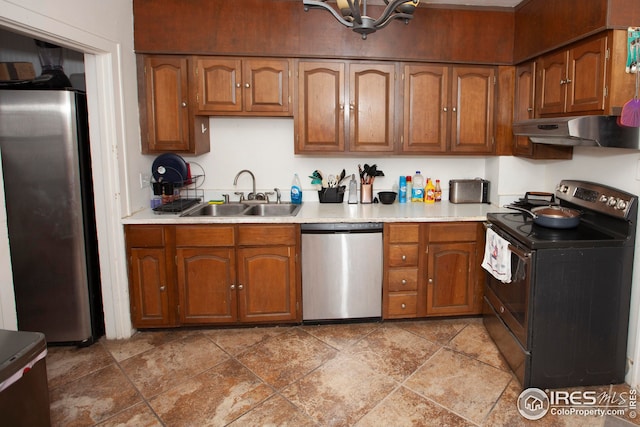 kitchen with appliances with stainless steel finishes and sink