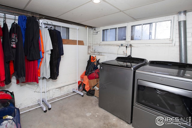 washroom with washer and dryer