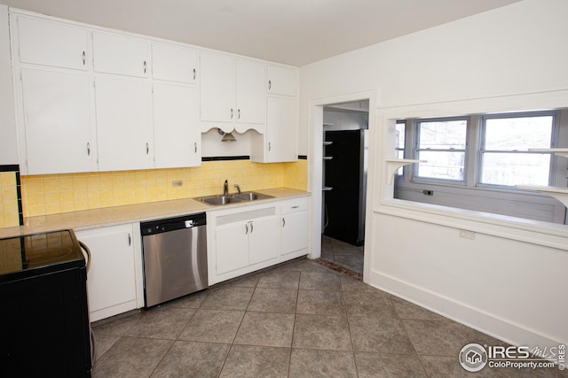 kitchen with white cabinetry, stainless steel dishwasher, sink, and backsplash