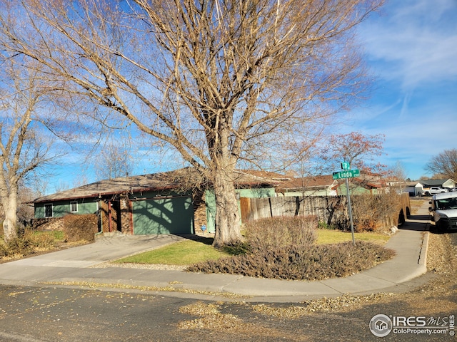 view of front of home with a garage