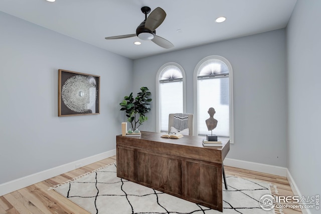 office featuring ceiling fan and light wood-type flooring