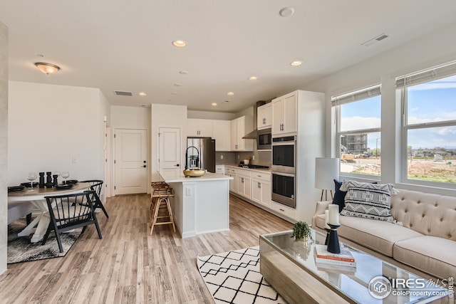 living room featuring light hardwood / wood-style floors