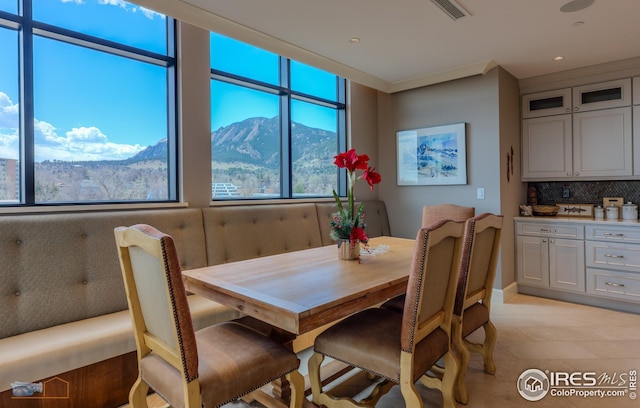 dining space featuring a mountain view