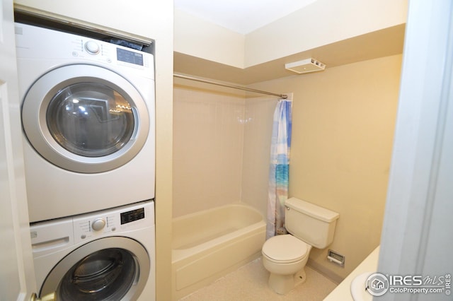 laundry room with laundry area and stacked washing maching and dryer