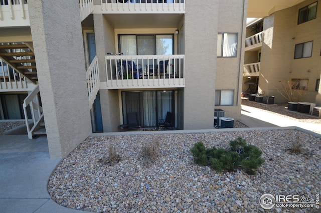 view of property featuring central AC unit