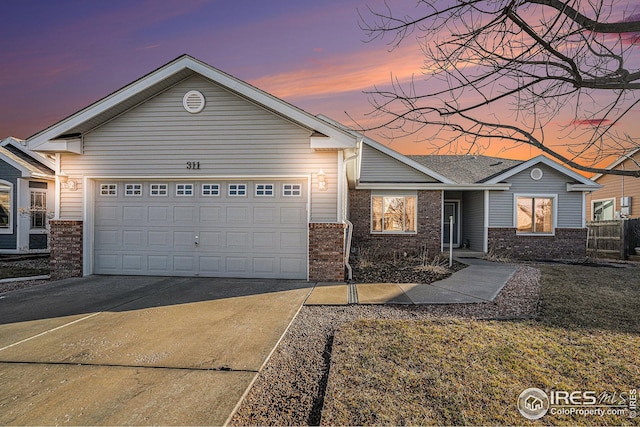 view of front of home featuring a garage