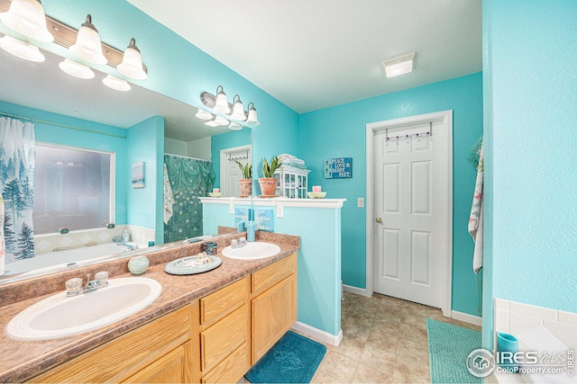 bathroom with plus walk in shower and vanity