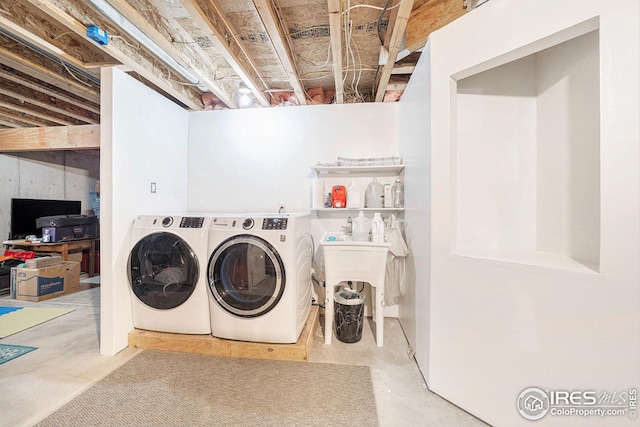 laundry area featuring washer and clothes dryer