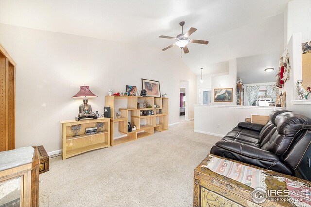 carpeted living room featuring ceiling fan and lofted ceiling