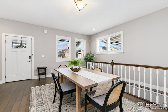 dining room featuring recessed lighting, baseboards, and dark wood-style flooring