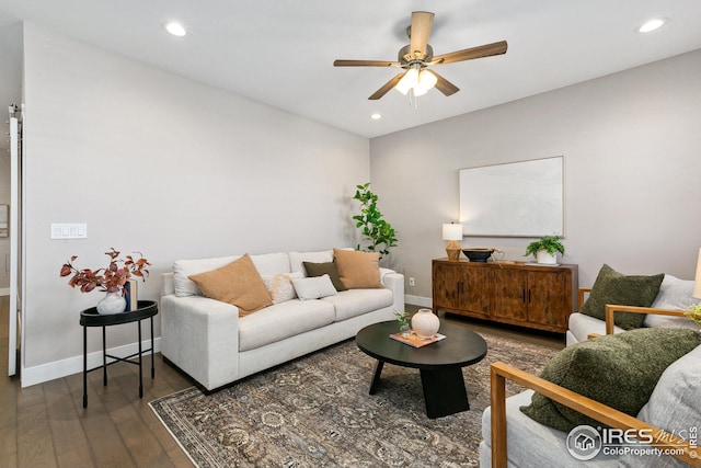 living room with recessed lighting, a ceiling fan, dark wood finished floors, and baseboards