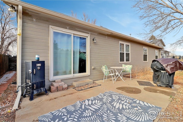 rear view of property featuring a patio