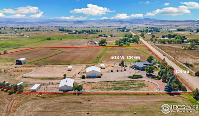 aerial view featuring a mountain view and a rural view