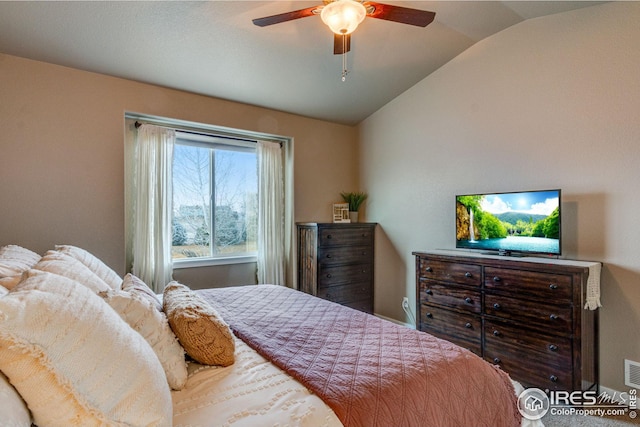 bedroom with ceiling fan and lofted ceiling