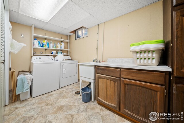 laundry room with washer and dryer