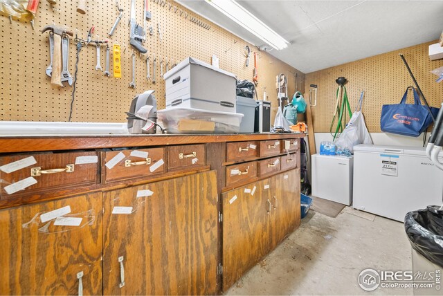 laundry room featuring a workshop area