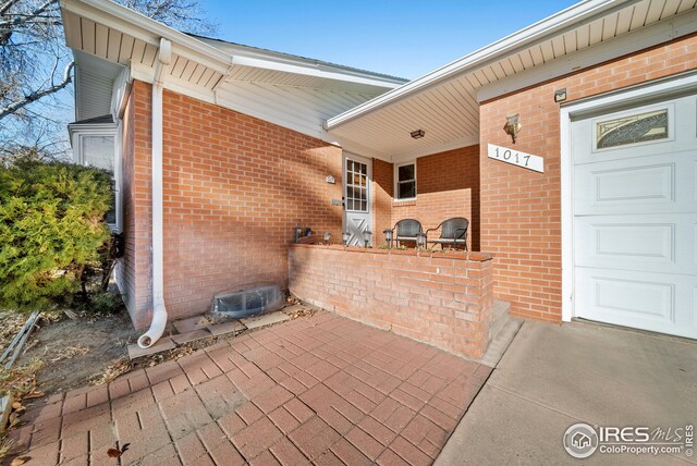 view of patio featuring a garage