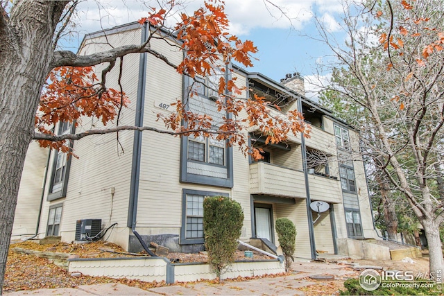 view of building exterior with central AC