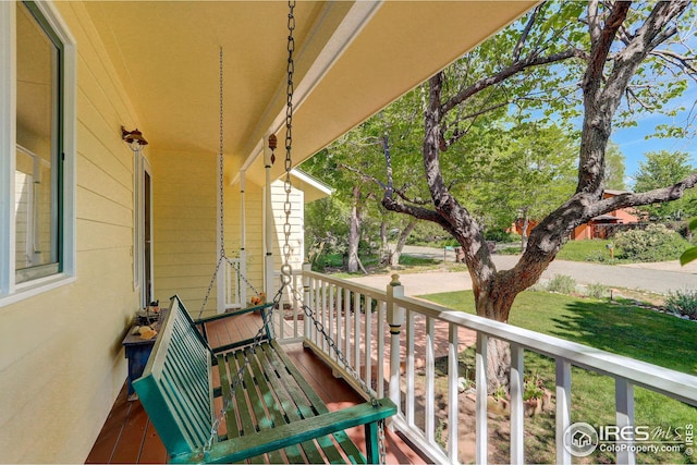 balcony featuring a porch